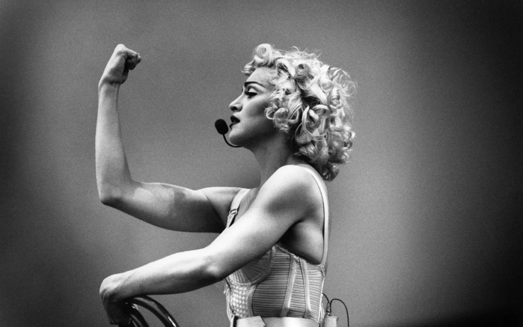 Madonna performs on stage at the Feyenoord stadium on July 24, 1990. Michel Linssen/Redferns