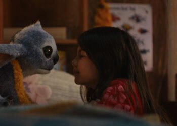 (L-R) Stitch and Maia Kealoha as Lilo in Disney’s live-action LILO & STITCH. Photo courtesy of Disney. © 2025 Disney Enterprises Inc. All Rights Reserved.